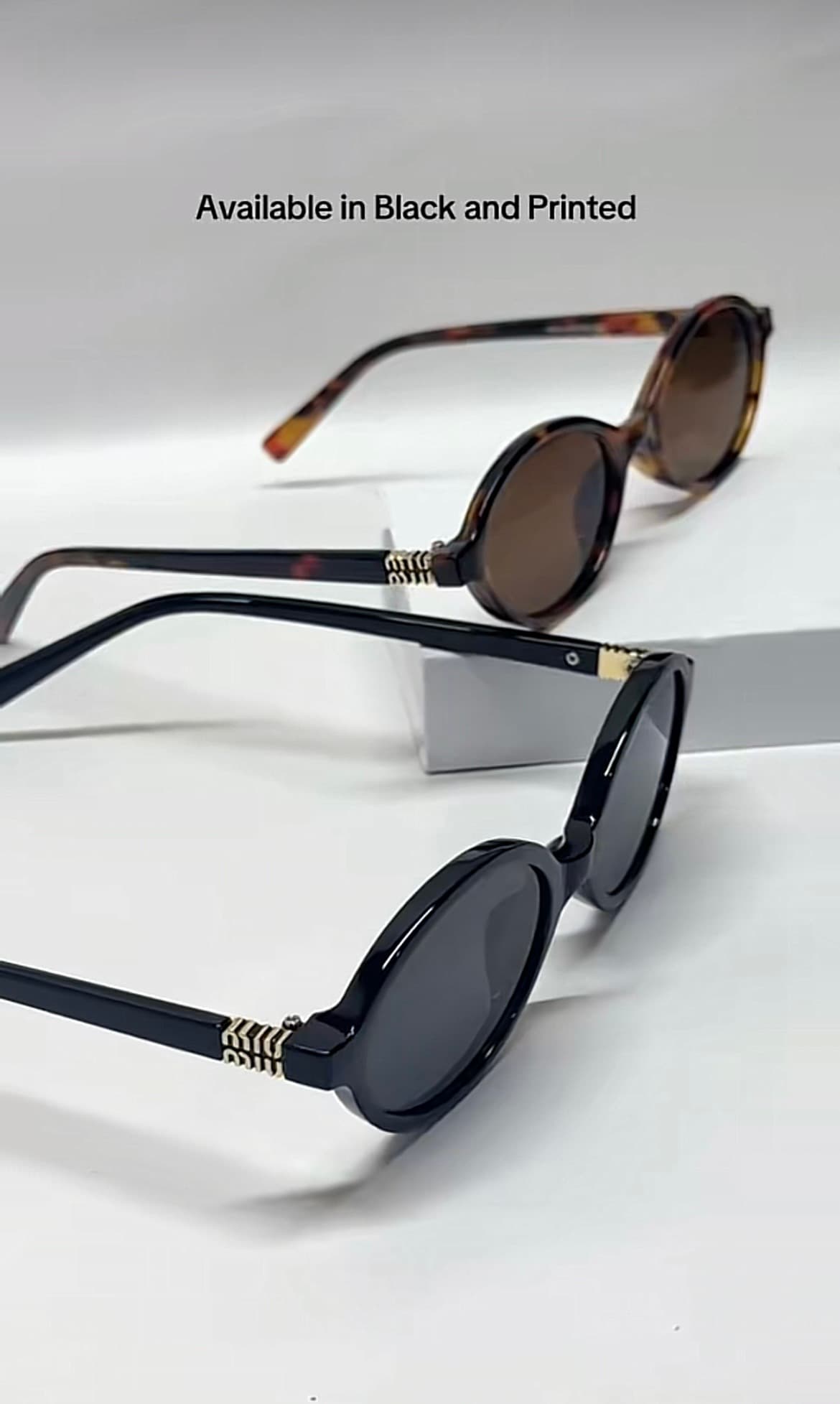 Lunettes de soleil ovales – Détails dorés